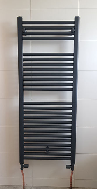  Towel rail and radiator installation image